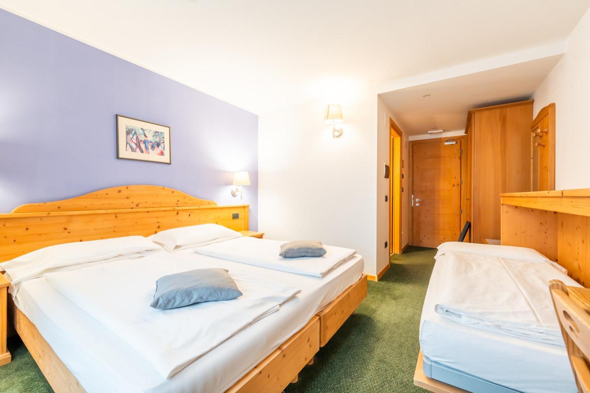 Dreibettzimmer mit Spa-Zugang
